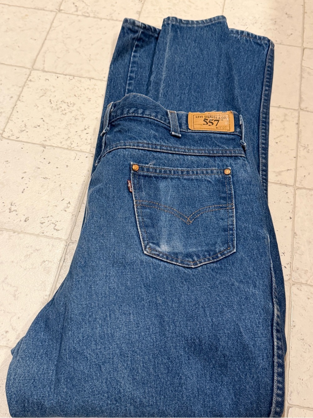 Vintage Levi's 557 Relaxed Fit Men's Jeans in Medium Blue Denim